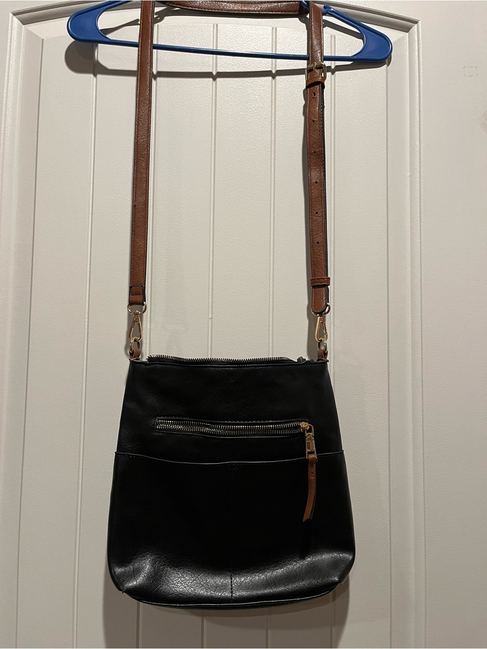 Classic Black Crossbody Bag with Brown Strap